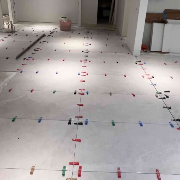 homeowner-consulting-with-tiler-sample-tiles-melbourne-service