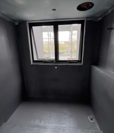 professional waterproofing contractor melbourne inspects bathroom shower leak