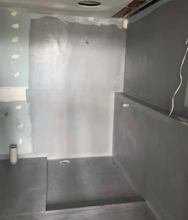 filling cracks shower wall before bathroom waterproofing melbourne