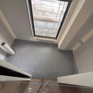 liquid waterproofing membrane application with brush detail shower corners