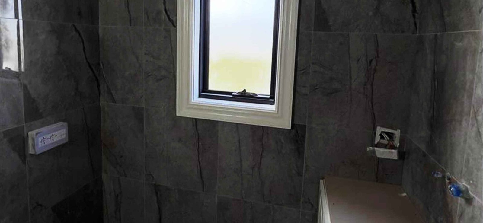 tiling, screeding, and waterproofing services by Complete Construction Service