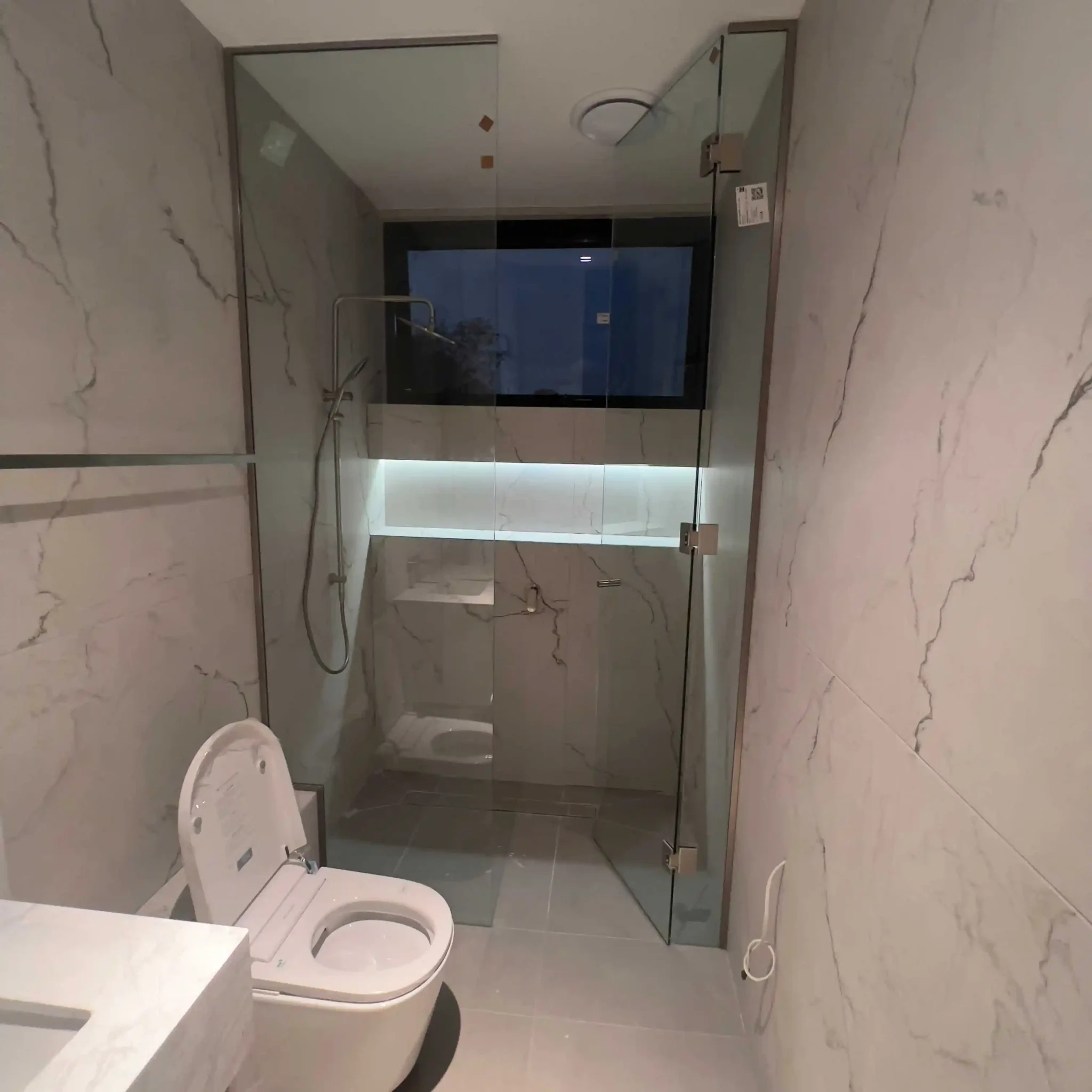 Finished bathroom floor with level tiles and clean grout lines