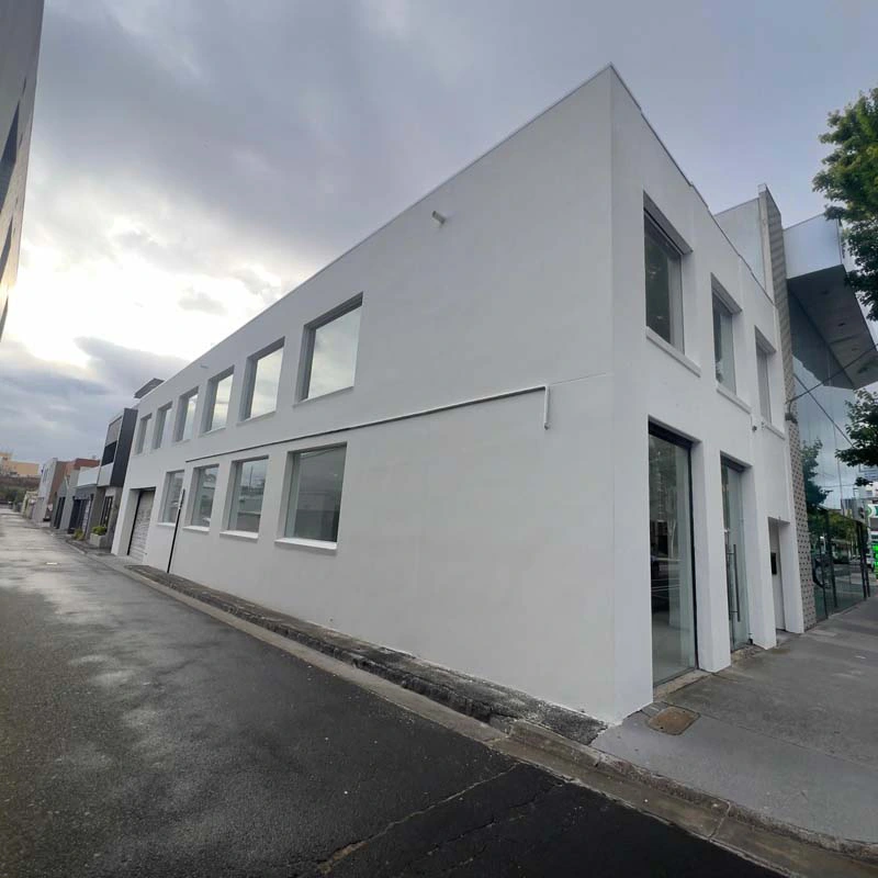White exterior rendered building in Melbourne