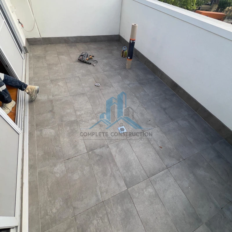Existing tiled balcony before leak repair services in Melbourne