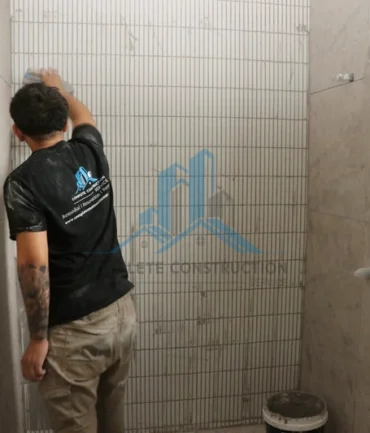 Grouting bathroom walls after retiling Melbourne