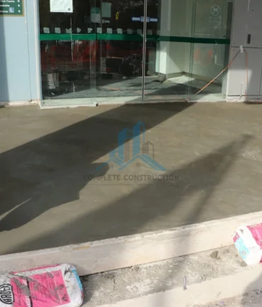 Screeding the Porch area for Paver Installation in Melbourne