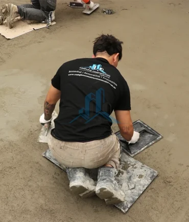 Tradeperson applying screed in Brighton Melbourne