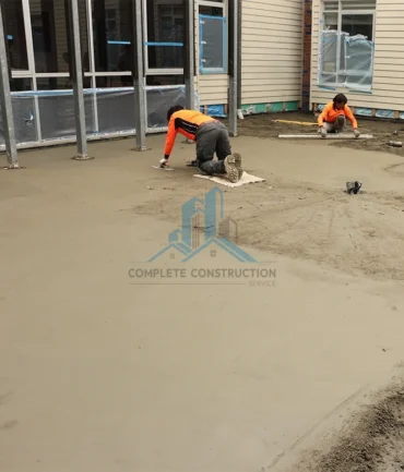 Professional person applying screed in Brighton Melbourne