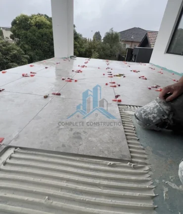 Tiling the balcony in Melbourne
