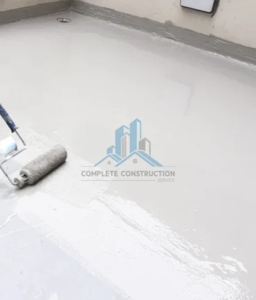 Liquid membrane rolled across Port Melbourne balcony