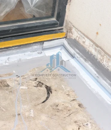 Waterproofing detail around balcony door threshold