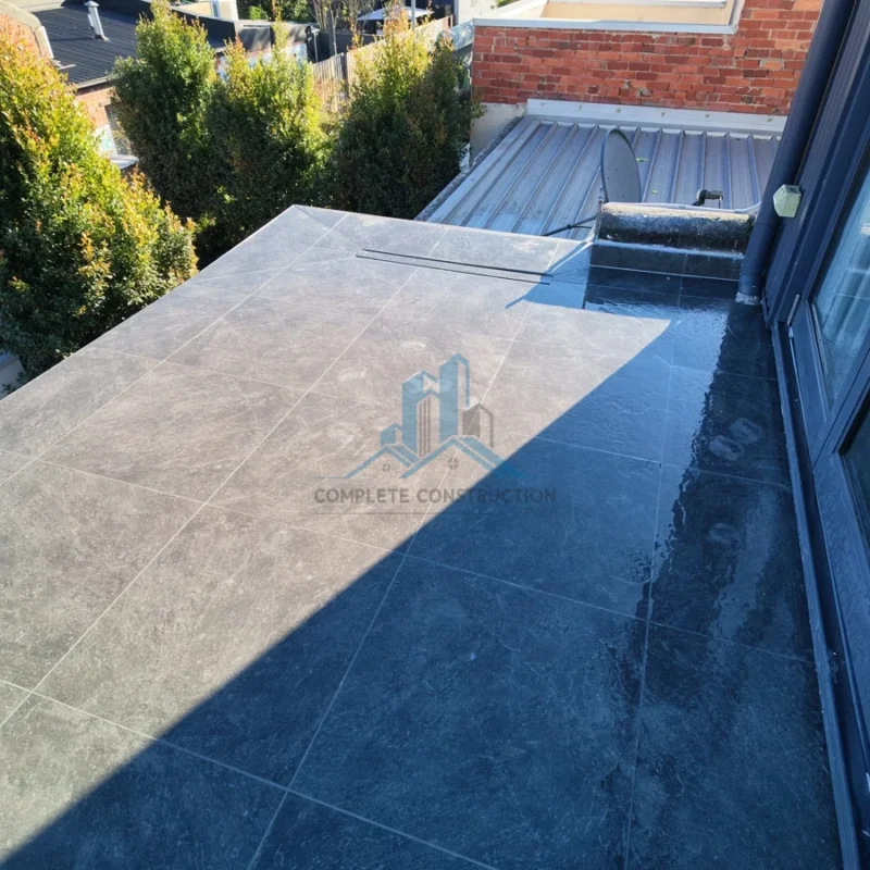Completed tiled balcony after waterproofing remediation