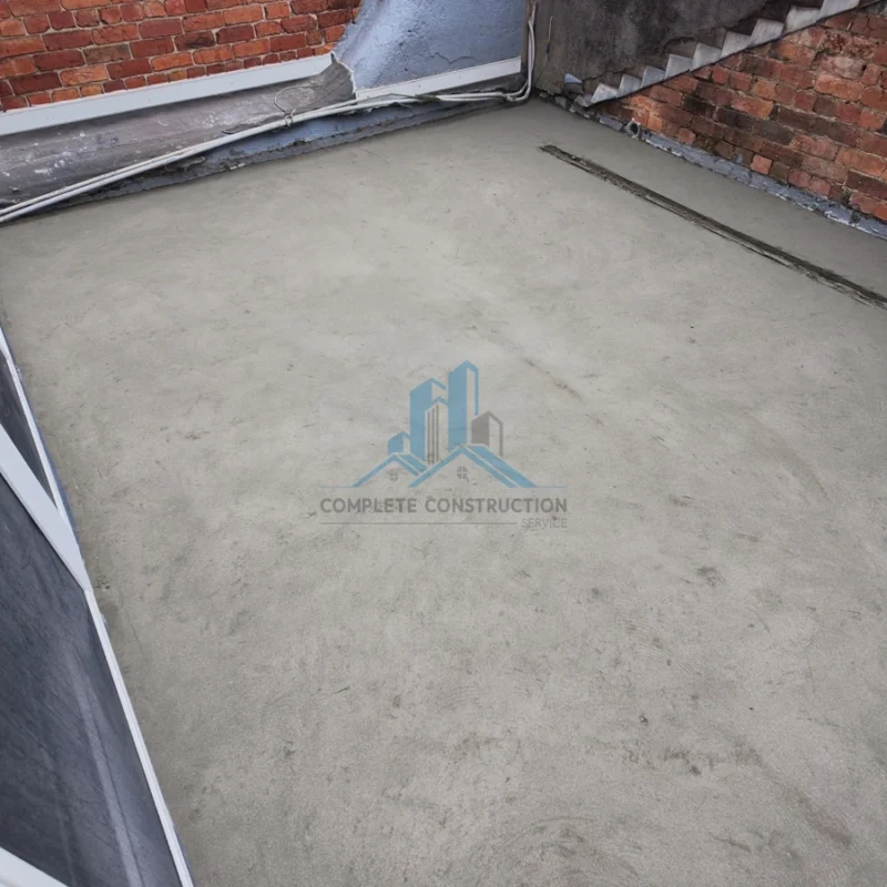 Completed balcony screed with falls to drainage outlet