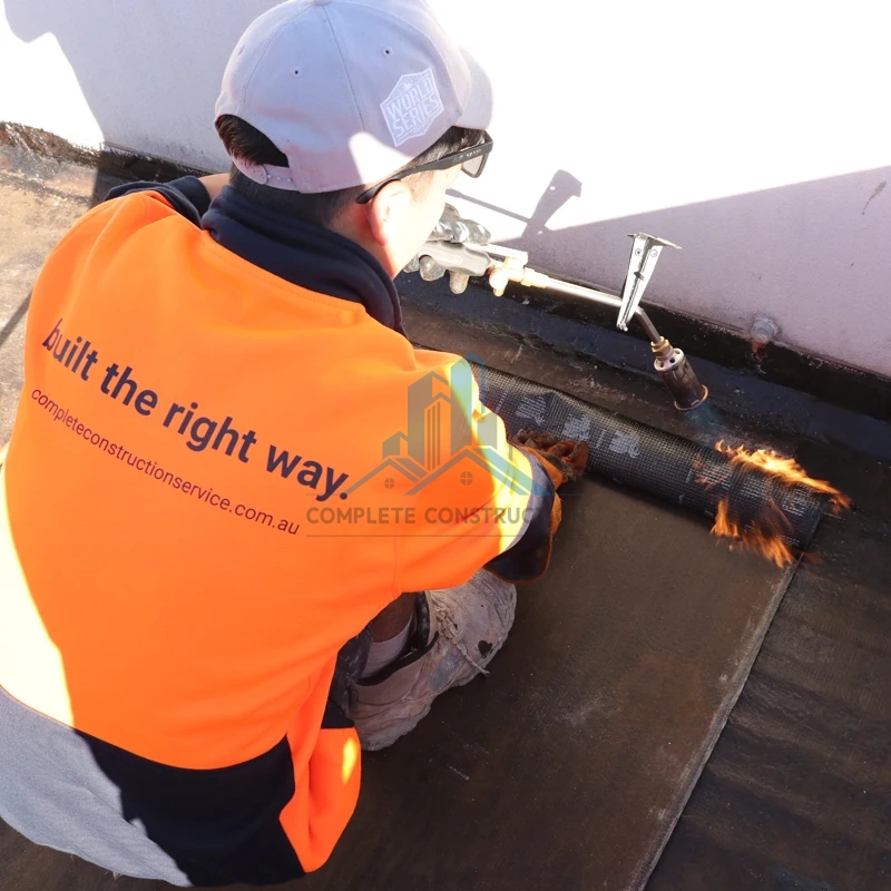 Torch-on membrane application, Barkly St Brunswick