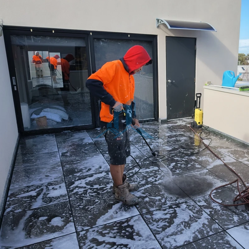 Cleaning terrace pavers after installation, Brunswick